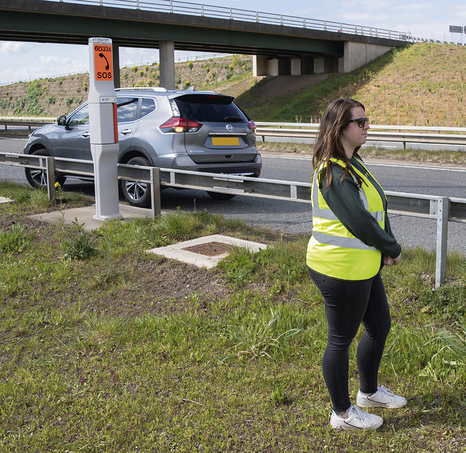 Keep well away from your vehicle and moving traffic